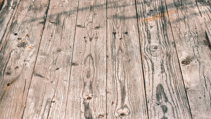 Weathered timber planks revealing aged textures and natural wear patterns for rustic charm