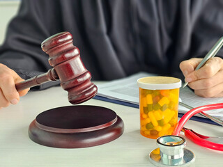 Courtroom settings highlight intersection of law, medicine, and justice through the use of a gavel...