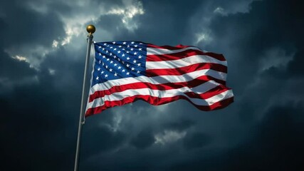 American flag waving against stormy sky