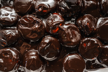 Classic profiteroles coated in rich, glossy dark chocolate sauce