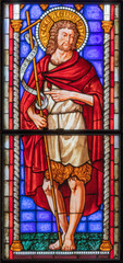 Fototapeta premium PIACENZA, ITALY - MAY 20, 2025: The St. John the Baptist in the stained glass in church Basilica di San Francesco by Franz Xaver Zettler from year 1889.