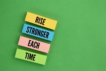 Inspirational and motivational words or quotes RISE STRONGER EACH TIME. to overcome adversity and...