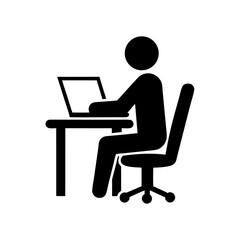A simple black icon of a person working on a laptop at a desk isolated on white background