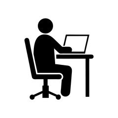 A simple black icon of a person working on a laptop at a desk isolated on white background
