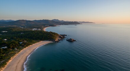 Fototapeta premium Beautiful Aerial View of Beach Coastline and Ocean at Sunrise