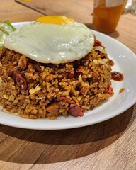 Photo Of A Plate Of Fried Rice With A Sunny Side Up Egg