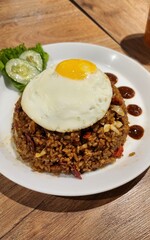 Photo Of A Plate Of Fried Rice With A Sunny Side Up Egg