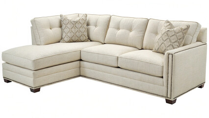 Naklejka premium Photo of a beige fabric sectional sofa with tufted cushions and patterned pillows sits isolated on white background