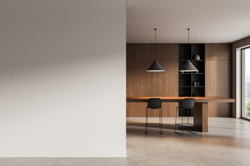 Clean interior with blank wall mockup next to modern wooden dining area and pendant lights in minimalist design layout concept for advertising use. 3D Rendering