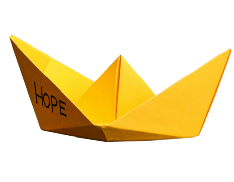 Bright Yellow Paper Boat Inscribed with 'Hope' Drifting on Rainwater