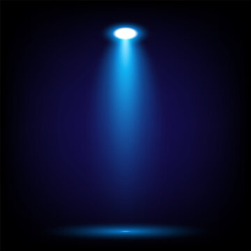 Isolated top down blue spotlight with shadow on black background, perfect for stage or clipart use
