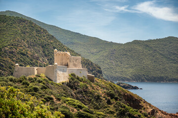 The recently renovated Genoese tower and fortress at Girolata, a small fishing village on the west coast of the mediteranean island of Corsica, only reached by foot or by boat