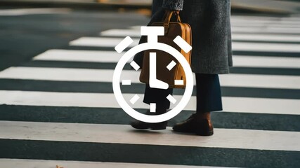 The video blurred background shows a white symbol with a stopwatch overlay on a human stands on a pedestrian crosswalk. - Powered by Adobe