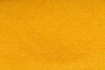 Frozen juicy sweet orange pulp background texture. 