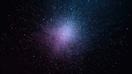 Obraz premium Blue and pink particle burst on dark background