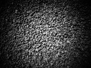Black and white dense pebble texture background
