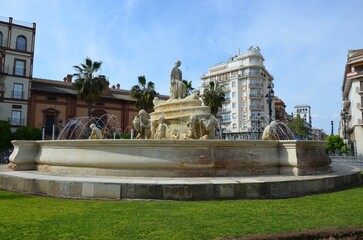 Fototapeta premium Seville, Spain 03.23.2019: The Hispalis fountain in the Puerta de Jerez roundabout