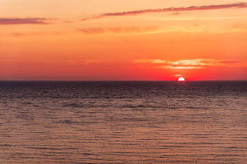 Beautiful red and orange sunrise over the sea.