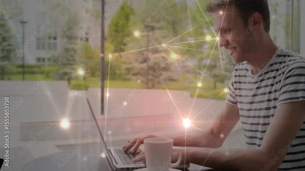 Poster glowing network appearing over man typing on laptop, animating tech data flow screen during coding