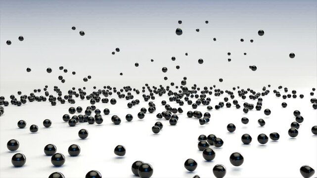Black Balls
This stock motion graphics video shows black balls falling and bouncing on a white surface.