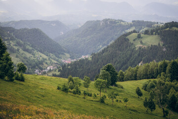Fototapeta premium The Carpathian Mountains in Romania are a majestic mountain range, rich in wildlife, forests, and breathtaking landscapes.