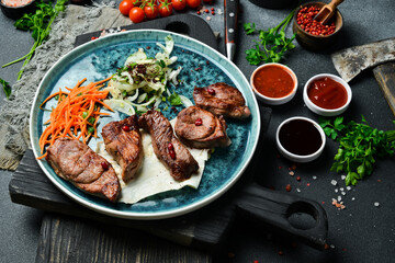 Grilled lamb shish kebab with onions and pita bread. Barbecue menu. Free space for text. Close up.