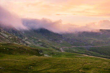 Sunset in the Carpathian Mountains is a magical moment — golden light bathes the peaks, clouds glow softly, and nature rests in silence and beauty.