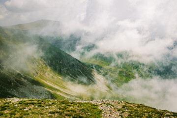 A beautiful landscape of mountains lost in the clouds