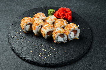 Sushi roll with tuna and cream cheese (Philadelphia). Asian cuisine. Close up. Free space for your text.