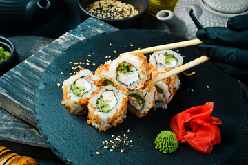 Roll with shrimp, cucumber and avocado. Sushi menu. Japanese food.