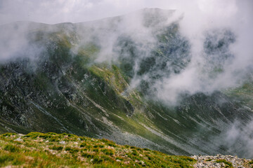 A beautiful landscape of mountains lost in the clouds