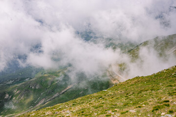A beautiful landscape of mountains lost in the clouds