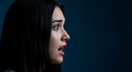 Close-up of a woman expressing surprise and fear.