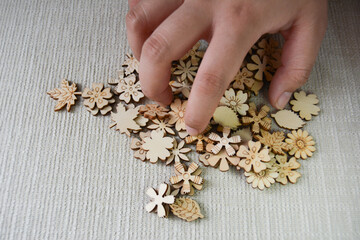 Photo Of A Pile Of Woods Carved Into Flowers