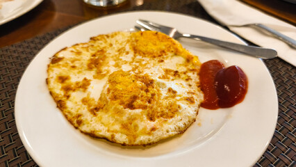 Delicious breakfast, top view of Fried Eggs, Indonesian name Beef Eye Eggs (telor mata sapi) Good for Breakfast