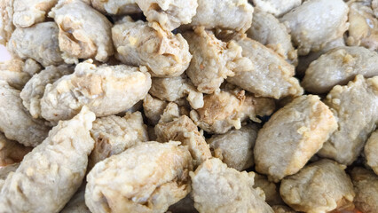 mpek-mpek or pempek. fish and tapioca are served with a sweet and sour sauce called gravy vinegar or vinegar sauce. Indonesian food pempek (Palembang)