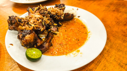 Sate taichan is a variant of satay containing grilled chicken without a peanut sauce or soy sauce coating like satay in general. This satay is only served with chili sauce and lime juice.