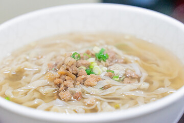 A comforting bowl of Taiwanese minced pork noodles served in a light savory broth. Tender noodles...