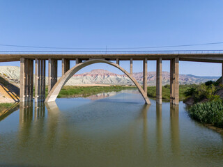 Nallihan Bird Sanctuary Ankara Turkey Majestic arch bridge spans a tranquil river. A stunning landscape view of a large arch bridge crossing a calm river. Turkiye best geology 
