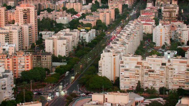 Ashdod city in Israel and evening view of the residential area of ​​this city with traffic at the crossroads. view from above of the city