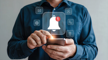 Man in blue shirt uses smartphone with glowing notification icons mobile phone technology