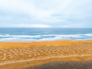 Aerial Drone View of Rauðisandur Golden Beach and Vibrant Blue Waters — Scenic Coastal Image