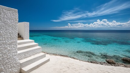 White Sand Steps Leading to a Turquoise Ocean Under a Bright Blue Sky with Fluffy Clouds