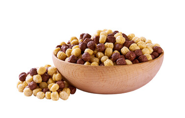 corn balls and chocolate corn balls pouring out of wooden bowl isolated on white background.