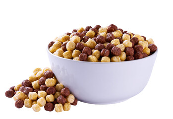 corn balls and chocolate corn balls pouring out of ceramic  bowl isolated on white background.