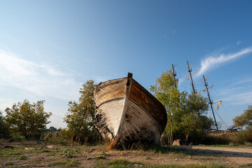 Old boats abandoned on the ground