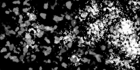 Snowflakes on dark background. white icy snowflakes isolated on black background, natural background. white crystalline powder on a black background. sugar dust. texture, pattern and clipping.