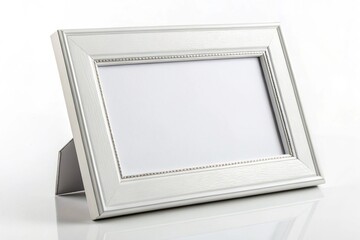 White photo frame mockup on white background. Blank space for artwork, photography, or poster design. Ideal for modern interior, wall decor, and product presentations.