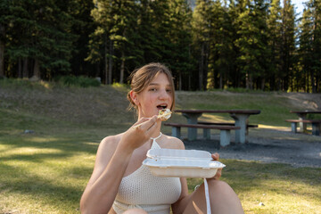 Woman about to eat sushi