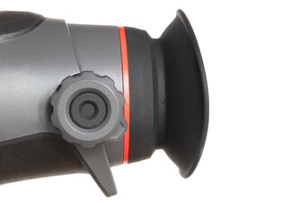 Close-up of the focus knob on a night vision monocular